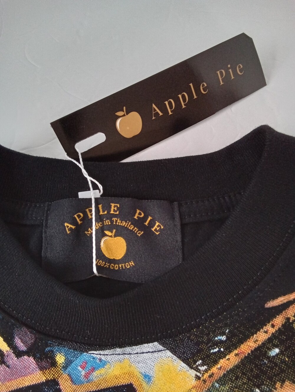 Apple Black Taz AOP Graphic Tee with Gold Logo and Multicolor Front Print - Picture 3 of 10